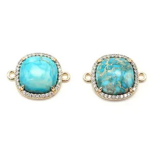 Detail showing square emperor stone connector with blue turquoise and gold plated zircon rim