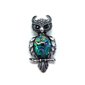 Retro owl pendant brooch in silver finish featuring iridescent abalone shell inlay