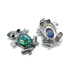 Frog pendant with abalone shell inlay and natural blue stone in vintage silver finish