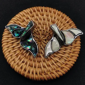 Walvisstaart hangers met iriserende abalone schelp en wit parelmoer inlegwerk