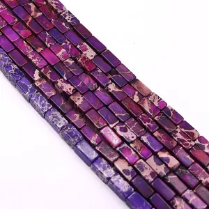 Detail shot of purple emperor stone tube beads with natural brown veins for DIY jewelry