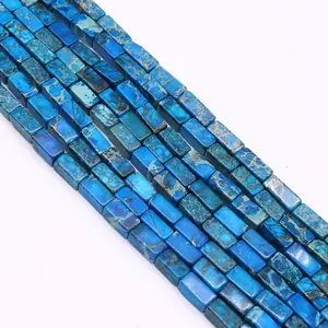 Macro view of blue sea sediment jasper rectangle spacer beads for DIY jewelry making