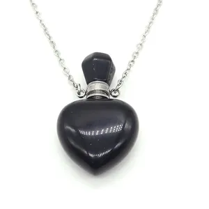 Heart-shaped black stone perfume bottle necklace with a fine silver chain and metal screw cap