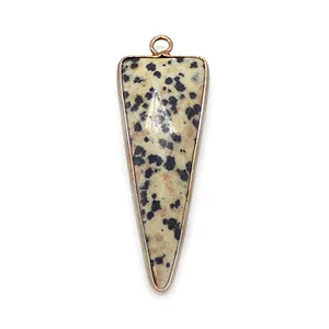 Macro detail of triangle marble stone pendant with gold edge for DIY jewelry making