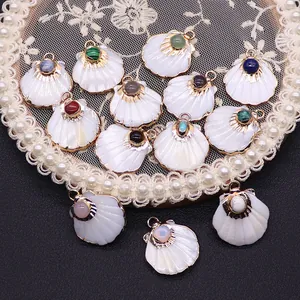 Natural freshwater shell scallop pendant with gold trim and inlaid colorful gemstones
