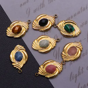 Golden stainless steel pendant with geometric twist texture and colorful natural stone
