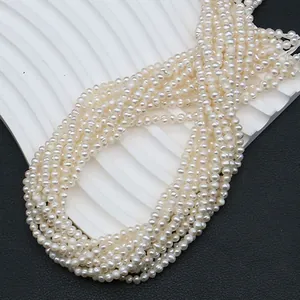 Natural freshwater pearl strands for DIY jewelry making on modern textured display
