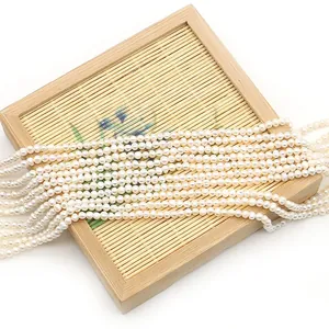 Natural freshwater white pearls on bamboo tray for DIY jewelry making accessories