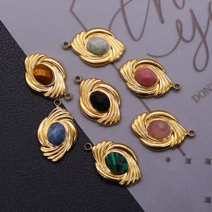 Set of 7 gold stainless steel oval pendants with diverse natural stones and spiral texture