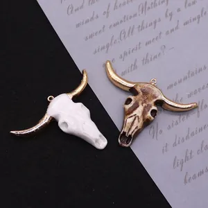 Resin bull skull pendants with gold horns in white and vintage brown for DIY jewelry