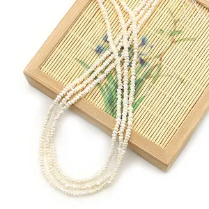 Irregular freshwater pearl strands for DIY jewelry making on a bamboo tray