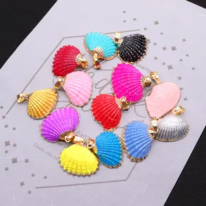 Colorful shell pendants with gold edges for DIY jewelry making in multiple vibrant colors