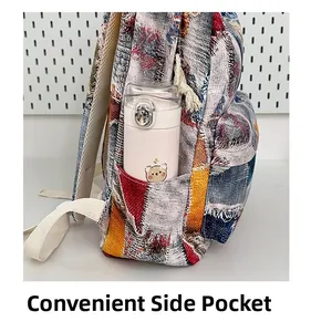 Close-up of functional side pocket on mini patchwork backpack with a water bottle