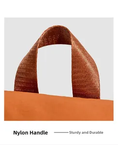 Detail des robusten orangen Nylon-Webgriffs mit professioneller Naht und Textur