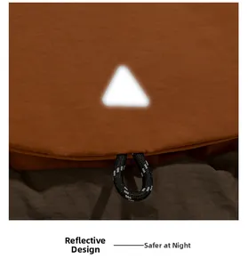Detailansicht von wasserabweisendem Stoff mit Reflektor-Patch und gewebtem Kordelzug