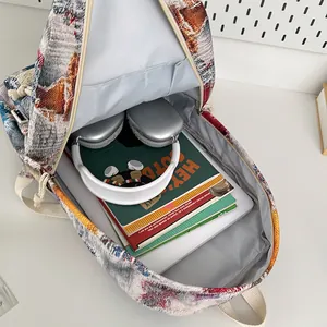Mini gradient tassel backpack interior showing spacious main compartment and pockets