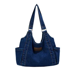 Large capacity navy denim canvas tote bag with contrast stitching and leather patch