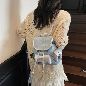 Vintage college style backpack in blue denim and silver leather with large capacity