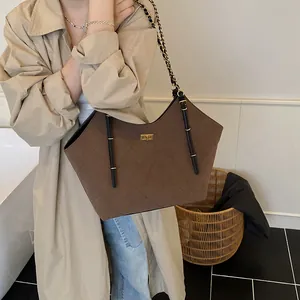 Quilted large tote bag in dark brown with gold turn-lock and chain strap for women