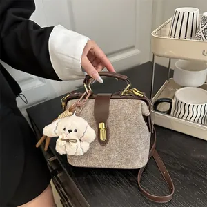 Retro doctor style handbag in beige tweed with brown leather straps and puppy charm