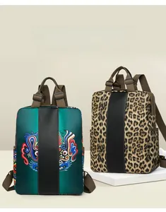 Travel focus nylon backpacks featuring vibrant lion mask and classic leopard print patterns