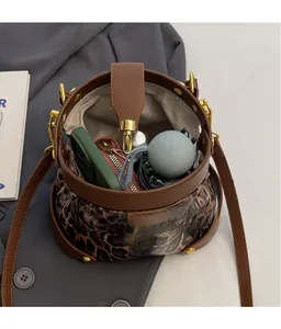 Top view of leopard print bucket bag interior showing spacious storage for daily items
