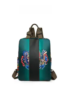 Detailed front view of nylon backpack with green body and traditional dragon pattern