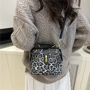 Leopard print satchel doctor bag with gold clasp and detachable shoulder strap for women