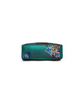 Close-up of teal nylon bag featuring vibrant abstract art print and smooth material