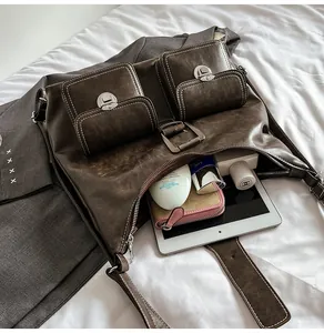 Deep brown retro tote bag interior showing large capacity for iPad and cosmetics