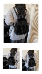 Detail of plush black faux fur backpack with adjustable straps and drawstring closure