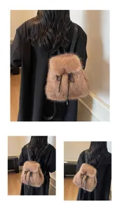 Detailed view of plush faux fur drawstring backpack in brown with slim black straps