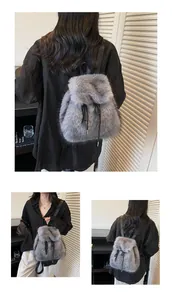 Detail view of light grey faux fur backpack with drawstring and long fluffy texture