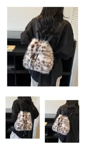 Detail of leopard print faux fur backpack with drawstring closure and bow accent