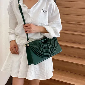Fashionable dark green woven textured crossbody bag with gold hardware for women