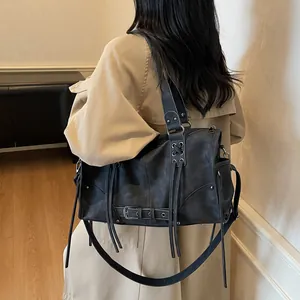 Retro motorcycle style tote bag in dark gray matte leather with tassel zipper details