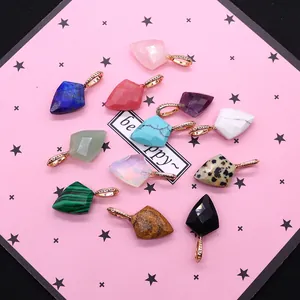 Faceted shield natural stone pendants in lapis and quartz with golden textured bails