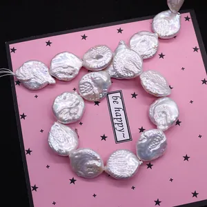 Natural white baroque coin pearls on pink star card for DIY jewelry making