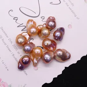 Natural baroque freshwater pearls in gold and purple hues with metallic luster