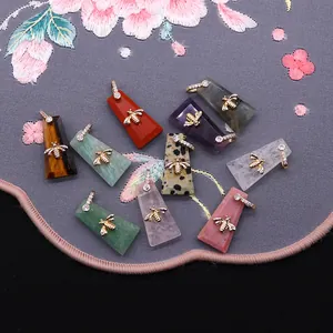 Natural gemstone trapezoid pendants with gold bee accents and paved crystal bail connectors