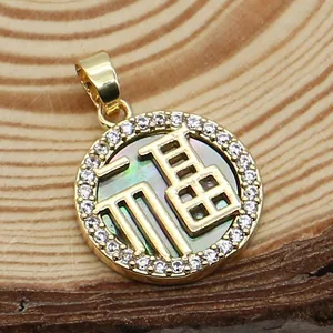 Detailed close-up of a Fu character round pendant with dark shell inlay and crystal border