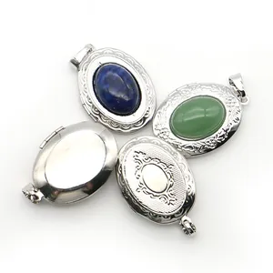 Oval silver locket pendants set with natural green stone and vintage floral engraving