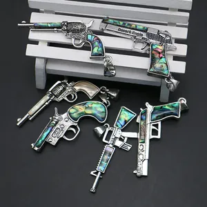 Pendentifs pistolet avec incrustations en nacre d'abalone et finition argentée vintage