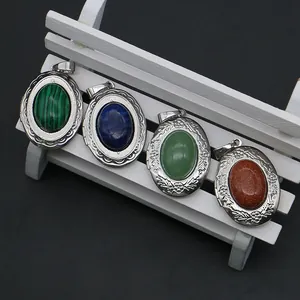Oval locket pendants with vintage floral etching and assorted colorful natural stones