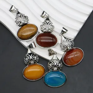 Gourd-shaped natural stone pendants with vintage relief metal filigree and crystals