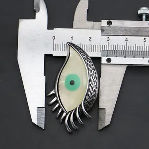 Measurement of 4.3cm silver Evil Eye pendant with natural shell and eyelash details