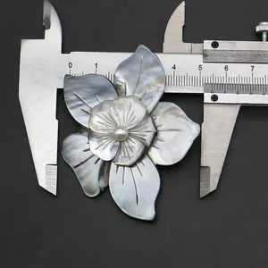 Detailed measurement of a 55mm gray mother of pearl flower pendant with a white pearl center