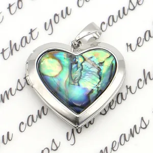 Polished silver heart-shaped locket pendant with iridescent abalone shell inlay