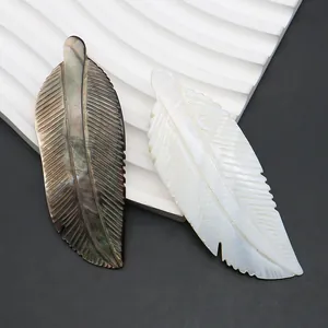 Natural sea shell feather pendant in white mother of pearl and abalone shell finish