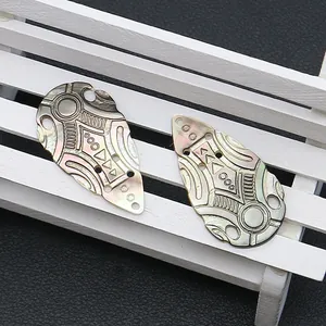 Iridescent natural black shell drop pendants with geometric tribal carvings for DIY jewelry